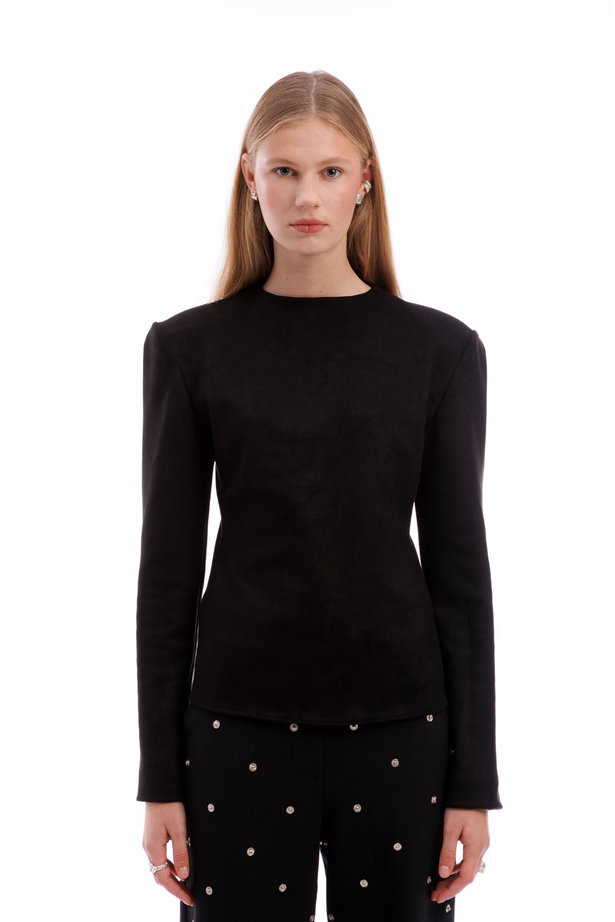 A606 fitted black long sleeve top with structured shoulders minimalist designer clothing